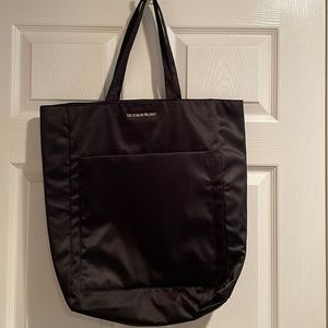 Victoria’s secret tote with makeup bag.